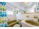 Retro bathroom with bathtub and shower at 7787 39Th N Ter # 7787, St Petersburg, FL 33709