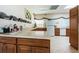 Community kitchenette with wood cabinets and appliances at 7787 39Th N Ter # 7787, St Petersburg, FL 33709