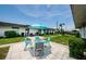 Small patio area with table and chairs at 7787 39Th N Ter # 7787, St Petersburg, FL 33709