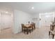 Dining area with table and chairs, near entryway at 16135 Weathered Windmill Ter, Odessa, FL 33556