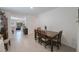 Bright dining area with view into living room at 16135 Weathered Windmill Ter, Odessa, FL 33556