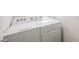 Convenient laundry room with washer and dryer at 16135 Weathered Windmill Ter, Odessa, FL 33556