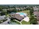 Resort-style community pool with ample lounge chairs and surrounding amenities at 2325 Pleasant Hill Ln, Holiday, FL 34691