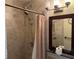 Shower with shower curtain, wall mounted shower head and fixture at 999 38Th Ne Ave, St Petersburg, FL 33704