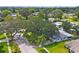 House nestled in a tree-lined neighborhood at 1995 Arvis E Cir, Clearwater, FL 33764