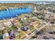 Stunning aerial view of a neighborhood near a bay, showcasing houses and lush greenery at 4132 4Th S St, St Petersburg, FL 33705