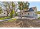 Charming exterior featuring well-maintained yard, lush trees, and a sidewalk leading to the entrance at 4132 4Th S St, St Petersburg, FL 33705