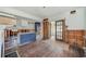 Spacious kitchen featuring hardwood floors, marble island and modern design elements under construction at 4132 4Th S St, St Petersburg, FL 33705