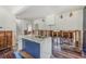 Kitchen featuring marble island, hardwood floors, and modern design elements under construction at 4132 4Th S St, St Petersburg, FL 33705