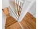 Bright staircase showcasing wood floors and white railing, leading to the upper level of the home at 4132 4Th S St, St Petersburg, FL 33705