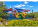 Community playground with shade structures at 6926 Surrey Oak Dr, Apollo Beach, FL 33572