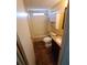 Clean bathroom with a bathtub and dark wood vanity at 283 Pelican N Dr, Oldsmar, FL 34677