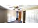 Bright bedroom with ceiling fan and double door closet at 283 Pelican N Dr, Oldsmar, FL 34677