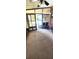 Spacious enclosed patio with access to backyard at 283 Pelican N Dr, Oldsmar, FL 34677