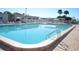 Inviting community swimming pool with brick deck at 283 Pelican N Dr, Oldsmar, FL 34677