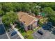 Aerial view of building showing the parking lot and pool at 1689 Hampton Ln # 1689, Palm Harbor, FL 34683