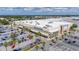 Aerial view of Whole Foods Market, highlighting its convenient location and expansive parking area at 2085 Hunters Glen Dr # 213, Dunedin, FL 34698