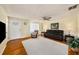 Bright living room featuring hardwood floors and comfortable seating at 707 2Nd Se St, Largo, FL 33771