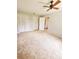 Bright bedroom with ceiling fan, double door closet and carpet flooring at 8356 Candlewood Rd # 0, Seminole, FL 33777