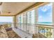 Spacious balcony with ample seating and beautiful ocean and city views at 1170 Gulf Blvd # 1005, Clearwater Beach, FL 33767