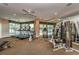 Well-equipped gym with treadmills, weights, and mirrored walls, offering a complete fitness experience at 1170 Gulf Blvd # 1005, Clearwater Beach, FL 33767