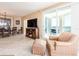 A living room and seating area with balcony access and large windows at 1170 Gulf Blvd # 1005, Clearwater Beach, FL 33767