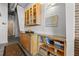 Hallway with built-in wooden cabinetry and shelving at 175 2Nd S St # 907, St Petersburg, FL 33701