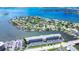 Wide aerial view of community and surrounding waterways at 1893 Shore S Dr # 206, South Pasadena, FL 33707
