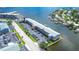 Aerial view of waterfront condo building with parking and boat slips at 1893 Shore S Dr # 206, South Pasadena, FL 33707