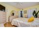 Bright bedroom with wood floors and built-in dresser at 1893 Shore S Dr # 206, South Pasadena, FL 33707