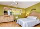 Bedroom with wood flooring and a ceiling fan at 1893 Shore S Dr # 206, South Pasadena, FL 33707