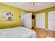 Bedroom with wood floors and ample closet space at 1893 Shore S Dr # 206, South Pasadena, FL 33707