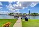 Scenic view of private dock and waterfront property at 1893 Shore S Dr # 206, South Pasadena, FL 33707