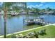 Private dock with seating area overlooking the water at 1893 Shore S Dr # 206, South Pasadena, FL 33707