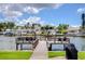 Backyard with a private dock offering scenic water views at 1893 Shore S Dr # 206, South Pasadena, FL 33707
