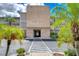 Shore Plaza condo building entrance with palm trees and walkway at 1893 Shore S Dr # 206, South Pasadena, FL 33707