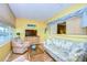 Bright living room with water views and comfy seating at 1893 Shore S Dr # 206, South Pasadena, FL 33707