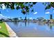 Scenic waterfront view of canal with boats and lush tropical landscape at 1893 Shore S Dr # 206, South Pasadena, FL 33707
