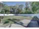 Large backyard with grassy area and playset at 6637 Poinsettia S Ave, St Petersburg, FL 33707