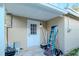 Back entrance features a white door and equipment at 219 6Th Sw Ave, Largo, FL 33770