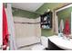 Clean bathroom with a shower/tub combo and updated vanity at 219 6Th Sw Ave, Largo, FL 33770