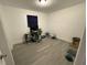 Bright bedroom with wood-look floors and plenty of space for a desk and other furniture at 219 6Th Sw Ave, Largo, FL 33770