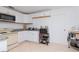 Efficient kitchen with white cabinets and granite countertops at 219 6Th Sw Ave, Largo, FL 33770
