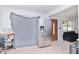 Kitchen with stainless steel refrigerator and entryway view at 219 6Th Sw Ave, Largo, FL 33770