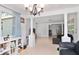 Open living room with tile floors and built-in shelving at 219 6Th Sw Ave, Largo, FL 33770