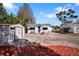 Cute bungalow features a brick paver driveway, storage shed, and a small landscaped yard at 4631 42Nd N Ave, St Petersburg, FL 33714