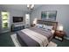 Comfortable bedroom with a large bed, modern decor, and ample natural light at 903 San Carlos Ne Ave, St Petersburg, FL 33702