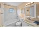 Clean bathroom with a shower/tub combo and updated vanity at 7030 Lafayette N, Pinellas Park, FL 33781