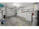 Attached garage with washer, dryer, and extra storage at 7030 Lafayette N, Pinellas Park, FL 33781