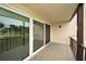 Private balcony showcasing a serene golf course view at 3021 Countryside Blvd # 28A, Clearwater, FL 33761